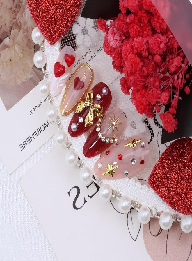 KRTBKR 24Pcs Valentines Day Press on Nails Medium Almond Red French Tip Fake Nails Gold Bow Star with Rhinestones Bling Full Cover Glue on Nails 3D Heart False Nails Valentines Stick on Nail for Women - Image 3
